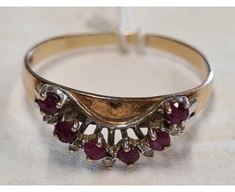 A DIAMOND &amp; RUBY 11 STONE RING SET IN 9ct GOLD