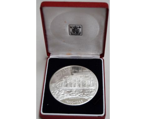 A silver Royal Mint £25 coin issued to commemorate the 100th anniversary of the self-sufficiency of the Falkland Islands, in 