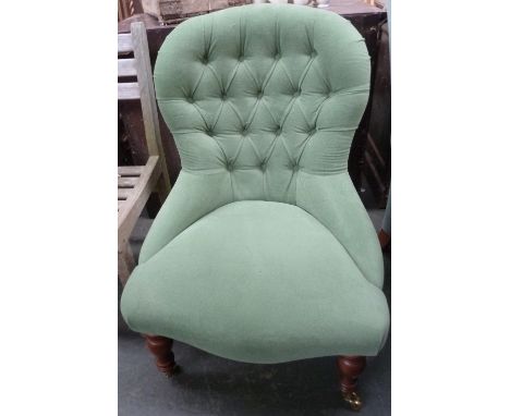 A button back saloon chair on casters 90cmH
