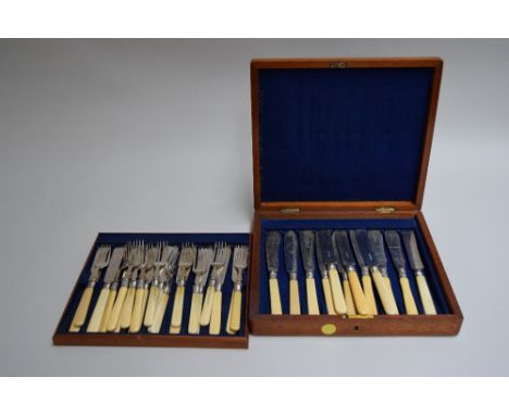 A set of matching flatware with stainless steel bodies and bone resin handles and most pieces with silver collars, the silver