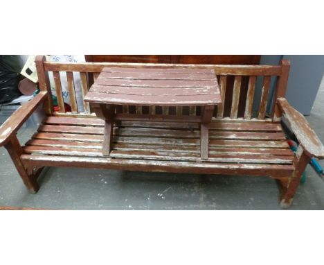 A garden bench together 183cmW with a small garden table