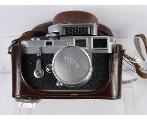 A Leica M3  Rangefinder Camera, Serial No 73345 dated 1955, fitted with a Summicron f=5 cm 1:2 Lens & Leica Light meter, incl