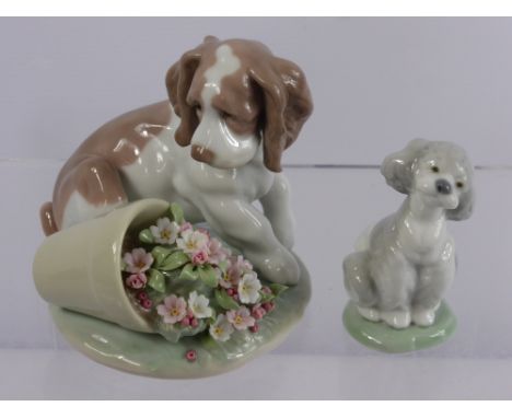 Lladro Society Porcelain Figurine, entitled 'It Wasn't Me', depicting a spaniel, No. 07672 dd 1998 in the original box togeth