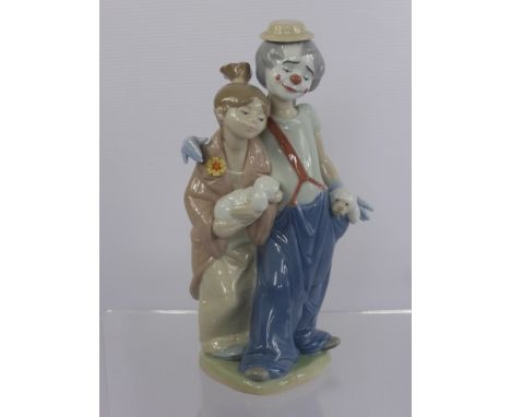 A Lladro Society Porcelain Figure entitled "Pals Forever" No. 07686 in the original box dd 2000, approx 23 cms high.