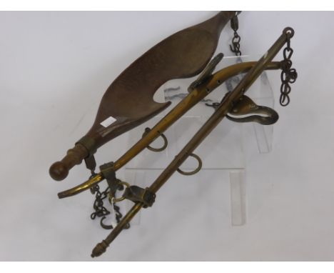 Vintage Agricultural Equipment, including a hoe, cattle yolk and brass plough- horse stays. (3)