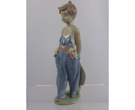 A Lladro Society Porcelain Figurine entitled "Pocketful of Wishes", No. 07650 dd 1997 approx 22 cms high.