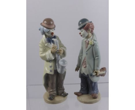 Two Lladro Porcelain Figurines entitled "Sad Sax" No. 05471 and "Circus Sam" No. 05472 both dd 1990 in original boxes.