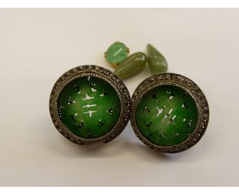 A Pair of Antique Chinese Apple Green Jade Earrings, the disc form earrings depicting Chinese character marks set in a silver