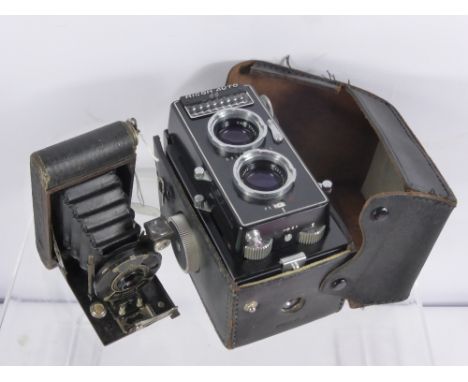 A Vintage Ritoh Auto 66 Camera and Case, together with a Kodak pocket camera no. 127. (2)