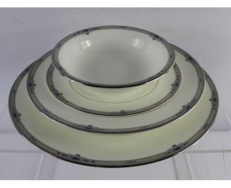 Part Wedgwood 'Amherst' Dinner Service, including six dinner plates, oval platter and bowl, cake plate, eight small plates, s