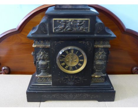 A Late 19th Century Slate Cased Mantel Clock, movement by A.D. Mougin, deux medailles, visible escapement, gilded Roman numer