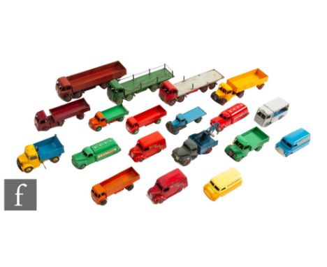 A collection of Dinky diecast model commercial vehicles, to include Foden Flat Truck with Chains, Studebaker 'Esso' Tanker et