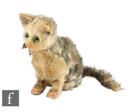 A Steiff Fluffy Cat, grey and white mohair, green plastic eyes, vertically stitched pink nose, button to ear, height 21cm, we