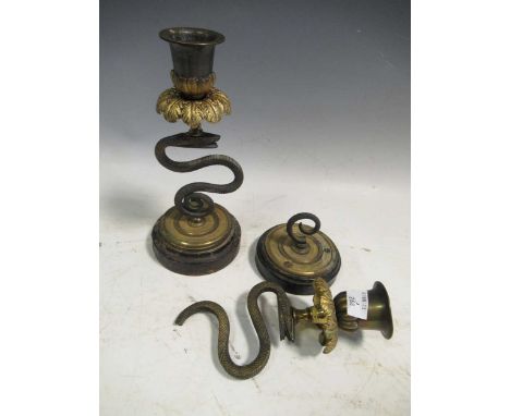 A George III damaged ivory tea caddy, and pair of snake stem gilt brass candlesticks 21cm high (one broken) (3)