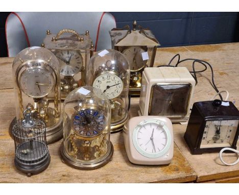 Collection of 9 various mantel clocks, some electric, including a small singing bird clock (9)Condition report: mostly not wo