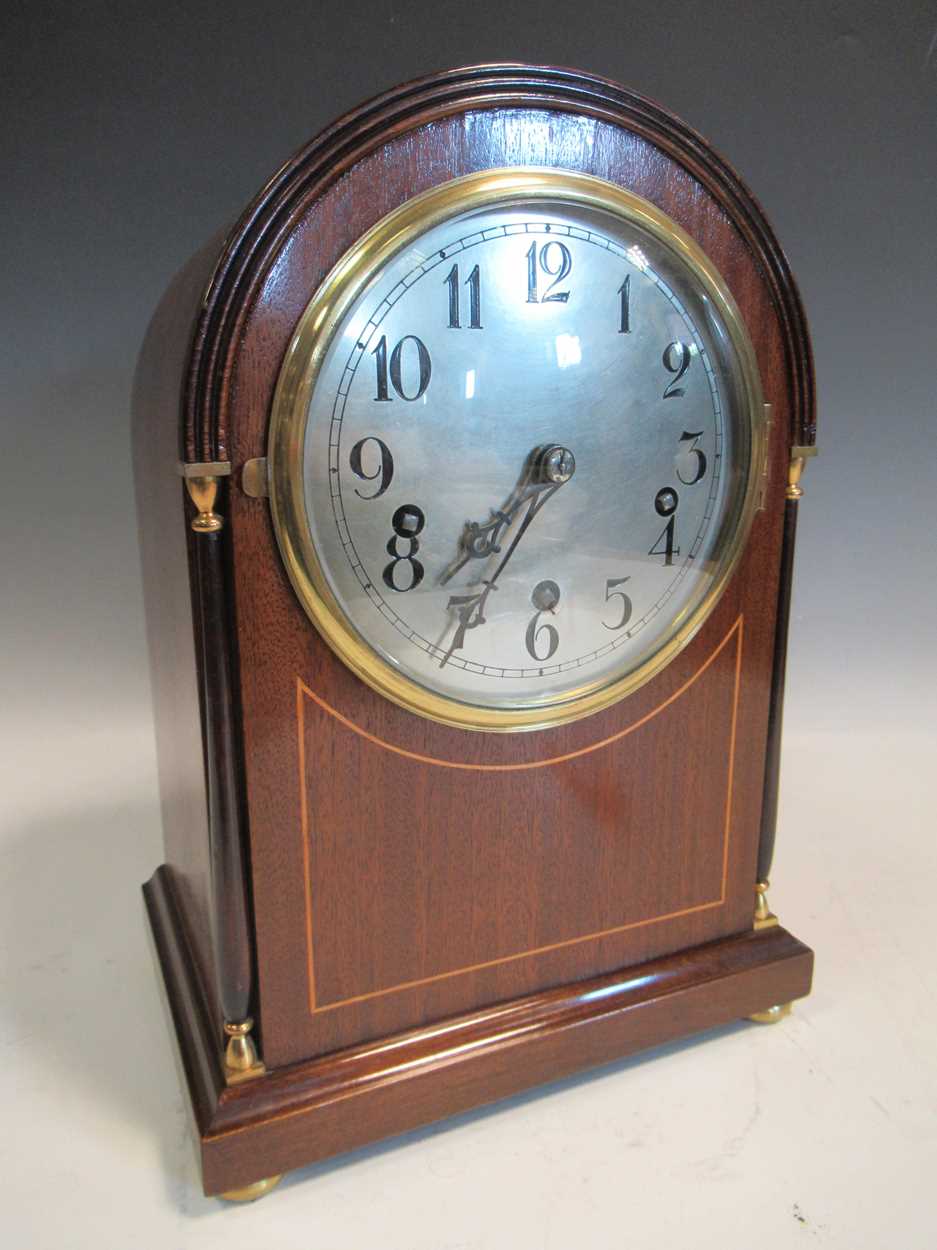 A German mahogany dome top mantel clock, 3 dong chiming movement, on