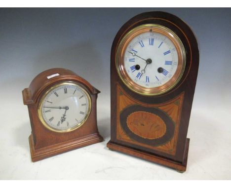 A mahogany and shell inlaid mantel clock, 9.5cm white dial, 29.5cm high; and another dome top mantel clock (2)
