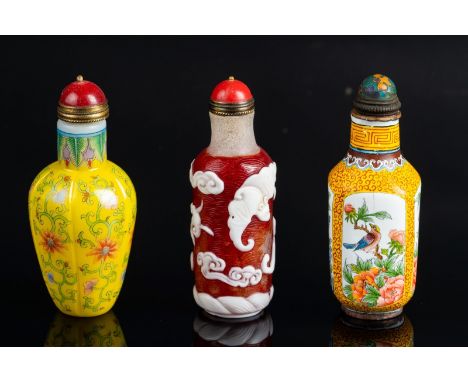 Chinese Art. Three snuff bottles  China, late 19th-20th century . A painted flowers enamel glass snuff bottle and stopper, 7.