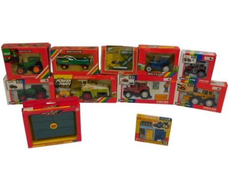 Britains boxed diecast farming implements and machinery, including 9530 Deutz Farm eight wheel tractor, 9521 County 1884 trac