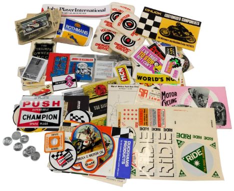 Various motorcycle racing related stickers, badges, etc., for The Triumph Owners MCC Club MCN, Rothmans, Devitt, Volunteer Em