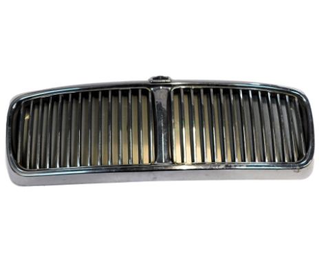 A Jaguar XJ6 chrome front grill, with lights 69cm wide. 
