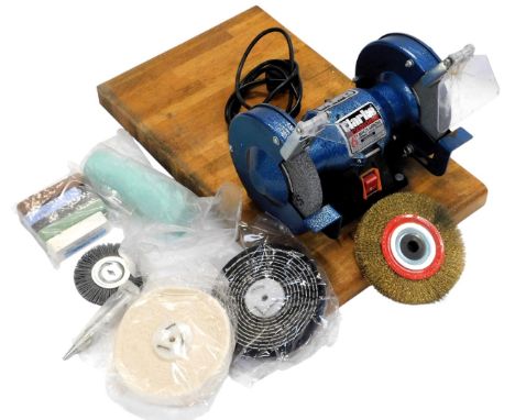 A Clarke metal worker 6" bench grinder, with polishing wheels, wire wheels, and compounds. (a quantity) 