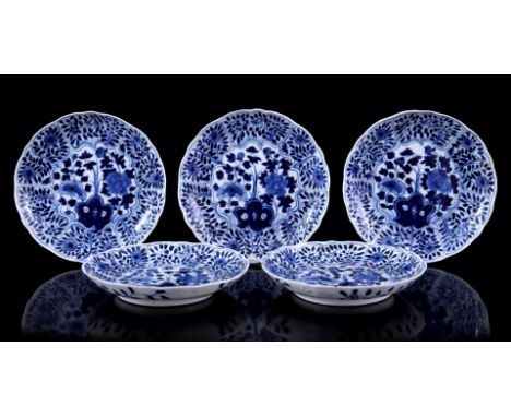 5 porcelain dishes with a contoured edge and parsley decor and bird on a branch divided into cartouches, marked on the bottom