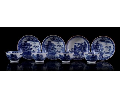 4 porcelain cups and saucers with blue and white decor of a pagoda near a pine tree in a mountain landscape and floral featur