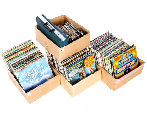 4 boxes with collection of approx. 270 LPs, mostly 1970s and 1980s and approx. 100 singles, mostly 1980s, and a Philips case 