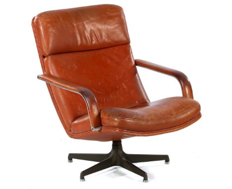 Geoffrey Harcourt  (1935-)Brown leather swivel armchair on a metal star foot, design Geoffrey Harcourt for Artifort, model F1