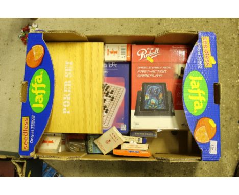 A box of games and playing cards; a Poker set etc. 