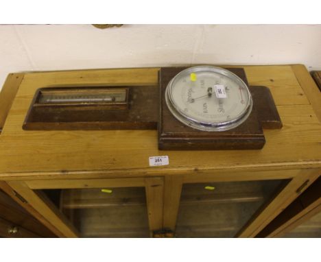 An oak barometer / thermometer 