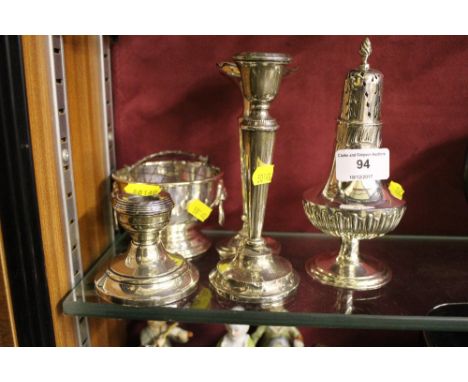 A silver sugar sifter together with a silver candlestick  AF, a dwarf silver candlestick, a spill vase, and a rose bowl