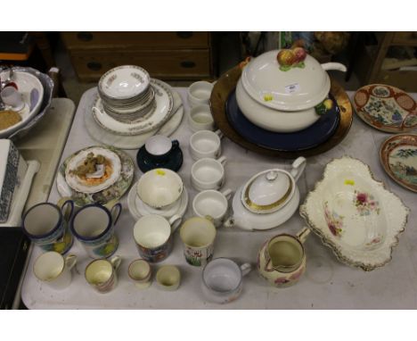 A large tureen and cover with ladle; a gilt decorated teapot etc. 