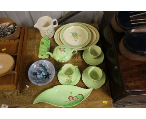 A quantity of Carltonware leaf decorated teaware; an Art Deco dinner plate, matching meat plate; a Hornsea jug etc.