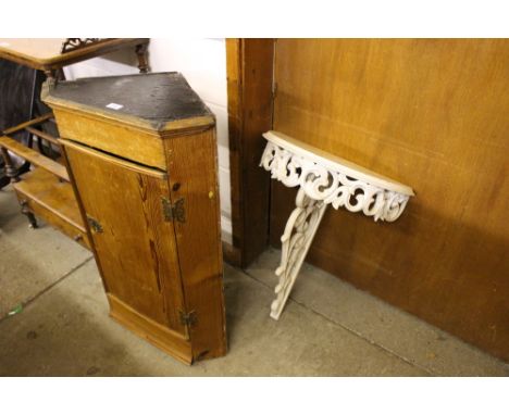 A 19th Century stripped pine hanging corner cupboard; and a white painted console table 