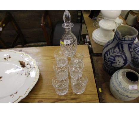 A Royal Doulton cut glass decanter with a set of six cut glass tumblers 