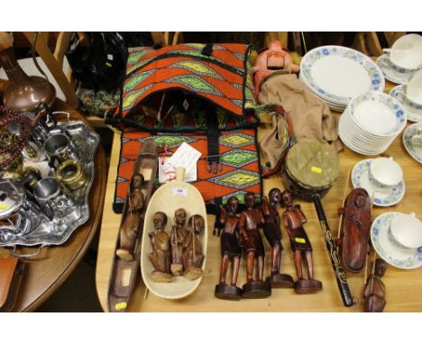 A quantity of carved wooden figures; a musical instrument; a puppet etc. 