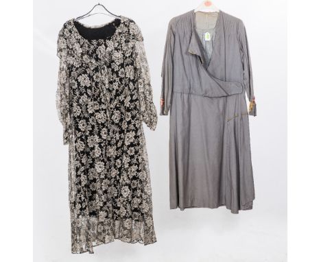 A 1920s grey day dress with integral floral embroidered modesty panel and cuffs with gilt and enamel buttons; tog. with a bla
