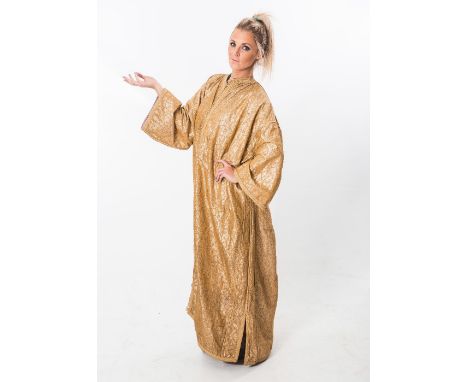A vintage gold brocade lady's coat in North African style