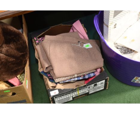 A group of vintage skirts and blouses