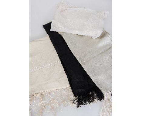 A group of vintage silk and lace stoles