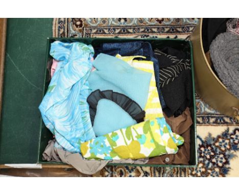 A group of vintage lady's clothing including 1970's floral hot pants, chiffon apron, blouses etc