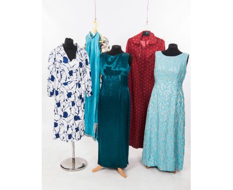 A group of six 1960's dresses including a floral print with a drop waist, a turquoise maxi shift dress, dark green satin dres