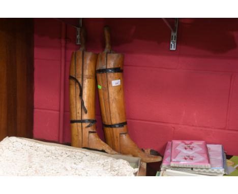 A pair of vintage wooden boot trees