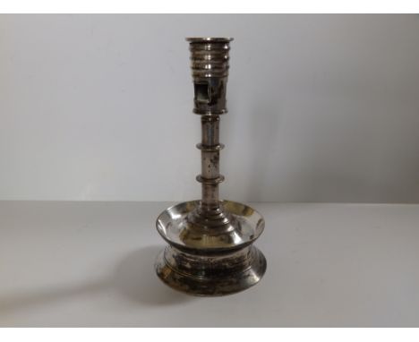 A silver plated capstan candlestick, 6.75" high.