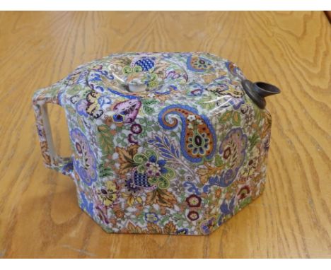 An art deco chintz pattern octagonal teapot with pewter spout - 'GMC', 6.75" across handle.