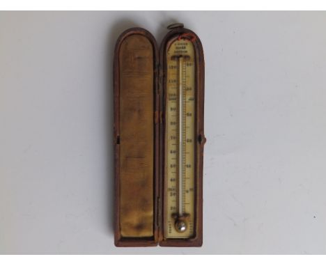 A Victorian travelling thermometer by Hicks, 6.5".