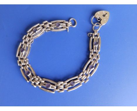 A 9ct amethyst set bracelet.