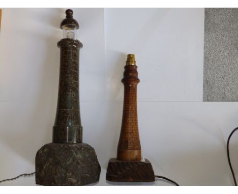 A Cornish serpentine marble lighthouse table lamp, 22" high  and a wooden lighthouse lamp.  (2)